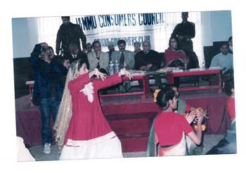 Honorable Minister Harsh Dev watching Shiv Vandana