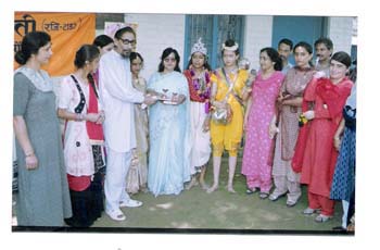 President Sanskar Bharti Presenting Momento to staff and students